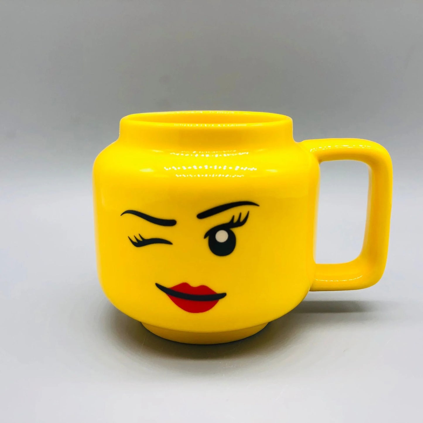 "Cartoon Ceramic Mug 250ml with Cute Impish Expression - Fun Drinkware for Couples, Friends, and Family"