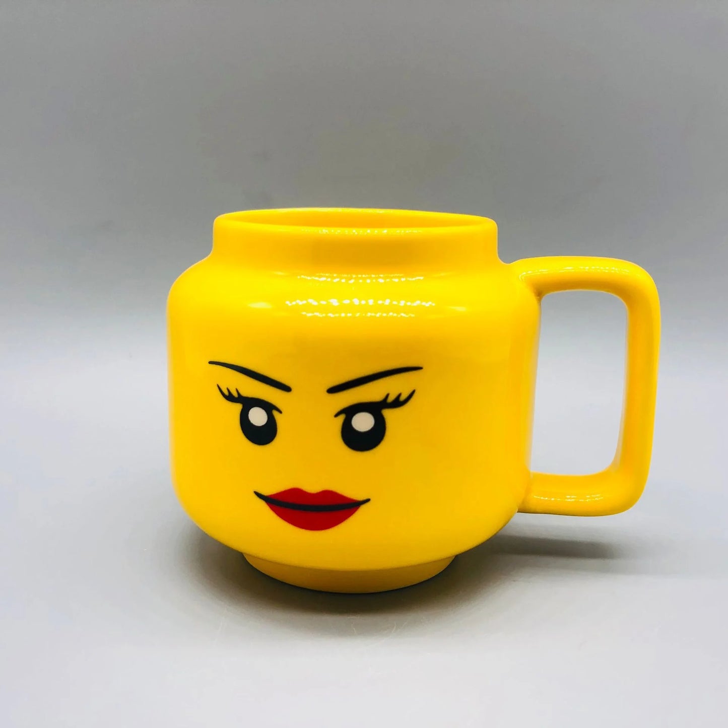 "Cartoon Ceramic Mug 250ml with Cute Impish Expression - Fun Drinkware for Couples, Friends, and Family"