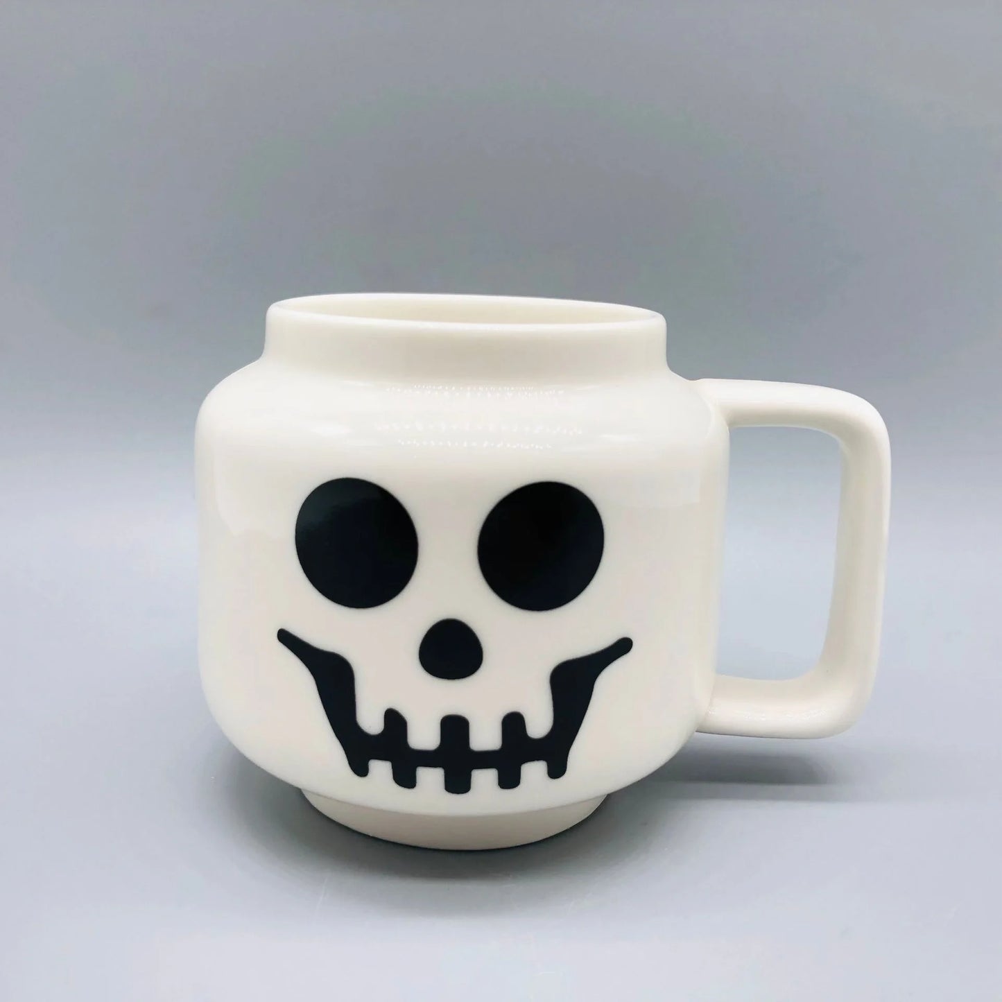 "Cartoon Ceramic Mug 250ml with Cute Impish Expression - Fun Drinkware for Couples, Friends, and Family"