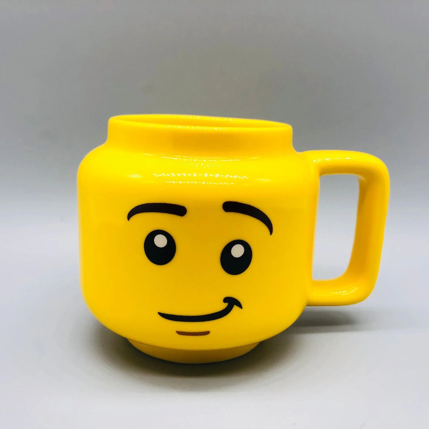 "Cartoon Ceramic Mug 250ml with Cute Impish Expression - Fun Drinkware for Couples, Friends, and Family"