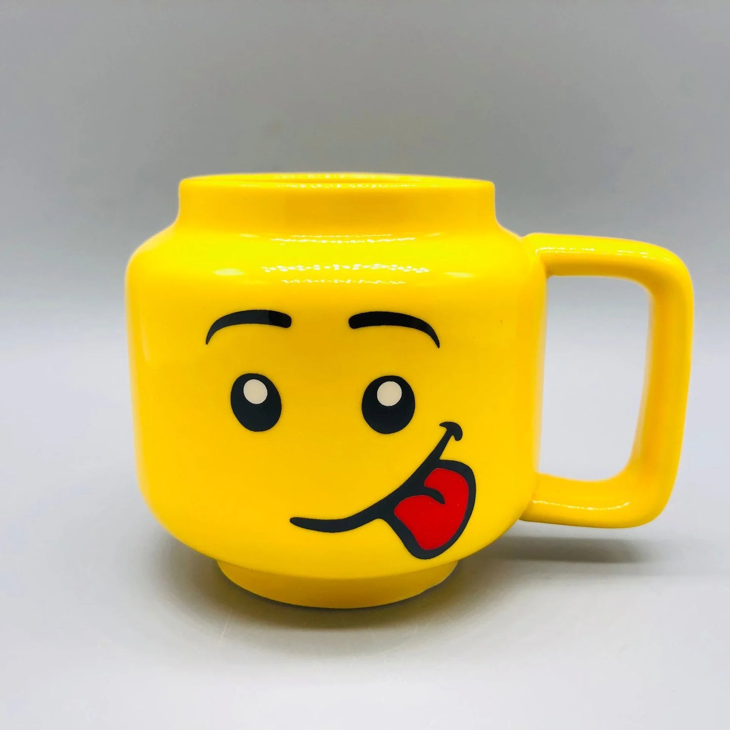 "Cartoon Ceramic Mug 250ml with Cute Impish Expression - Fun Drinkware for Couples, Friends, and Family"